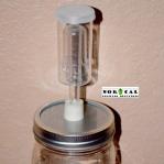 Ball, Kerr, Mason wide mouth canning jar stainless steel lid with drilled #3 stopper on Jar